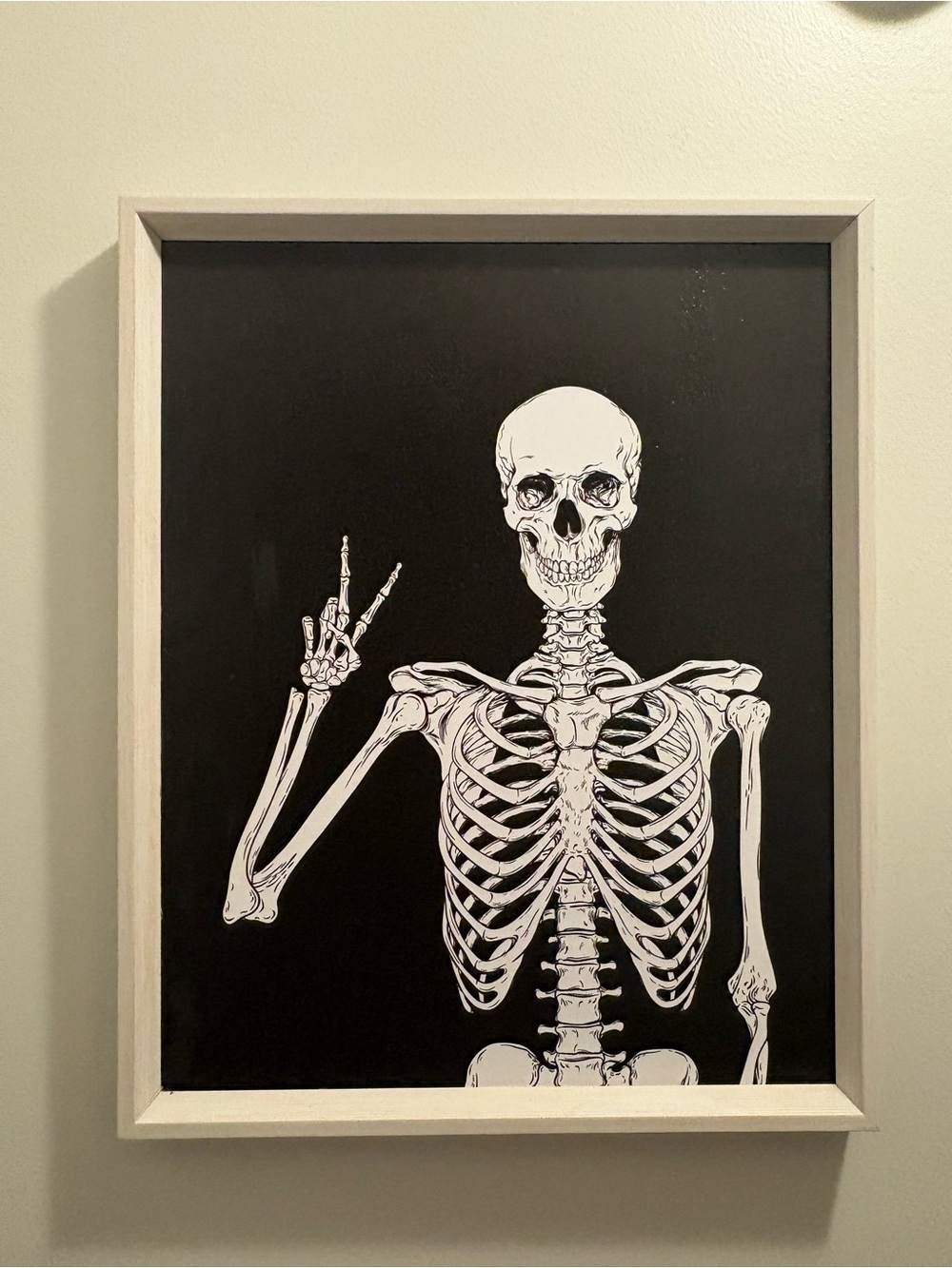 Kirkland’s skeleton peace sign Halloween wall art